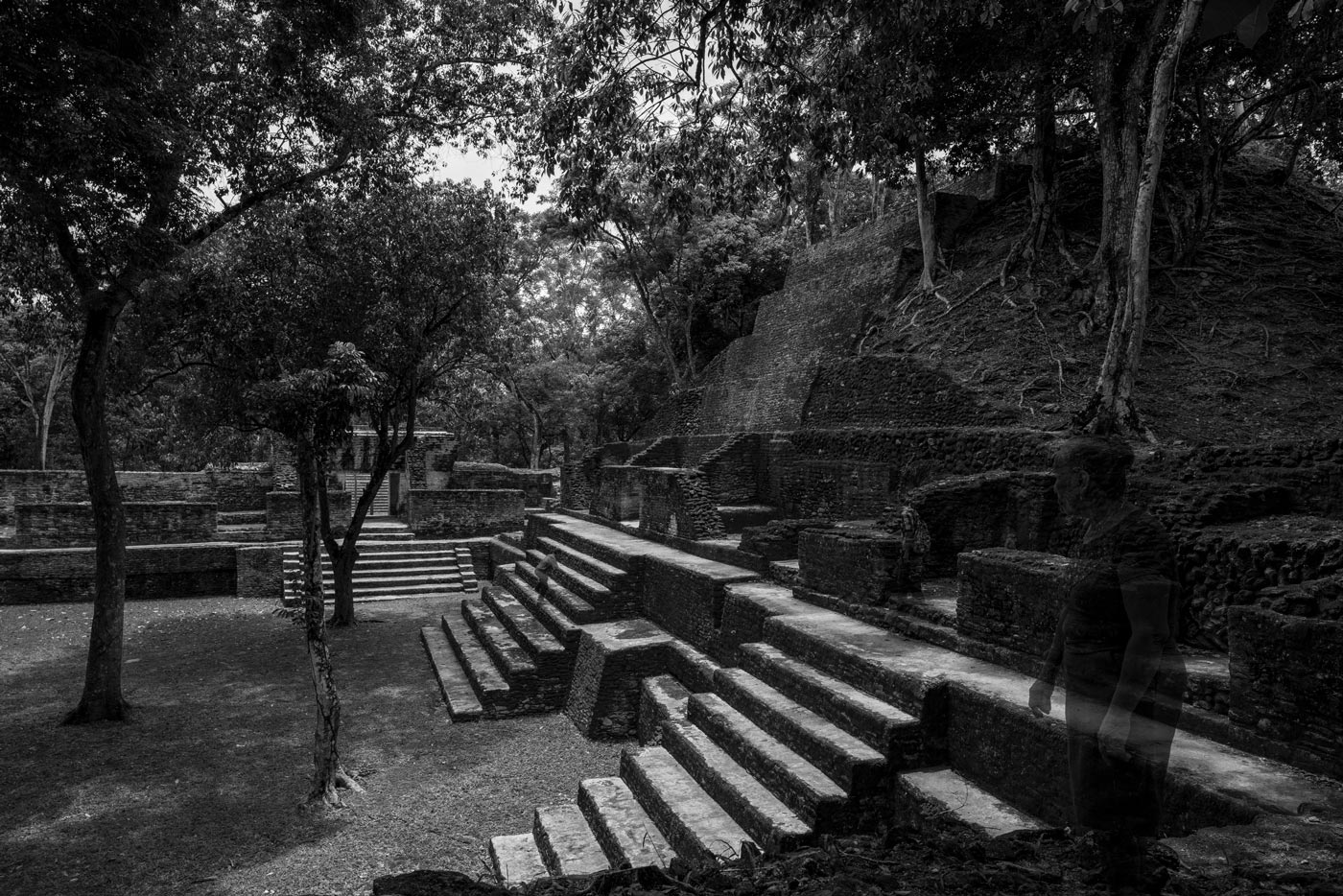 Faint figures on the terraces of Cahal Pech